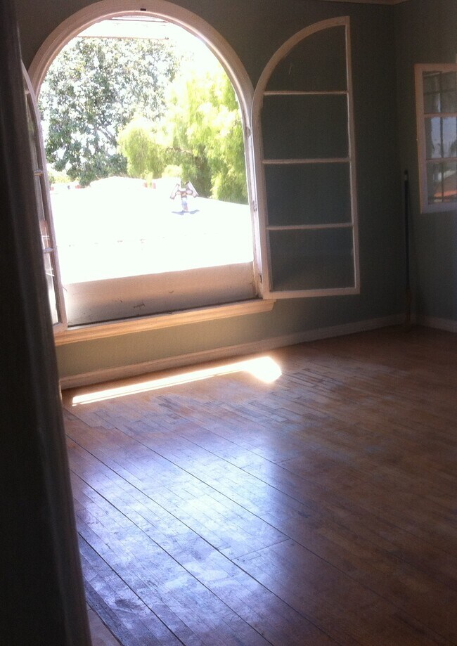 Huge Arched Window in Open Living/Dining - 5183 W 20th St