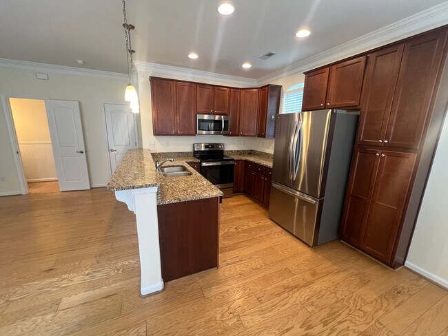 Foto del edificio - 5501 Curtis Breathwaite Ln