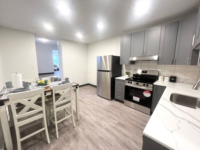 Building Photo - Newly Renovated Apartments Steps Away From...