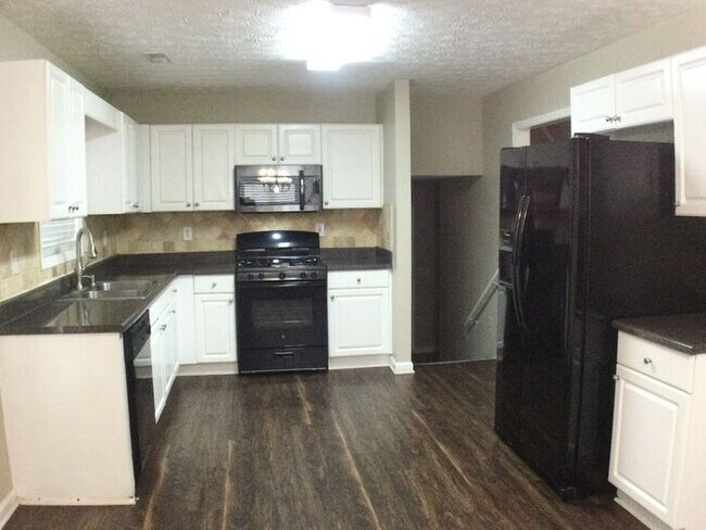 Building Photo - NOW AVAILABLE for QUICK MOVE IN