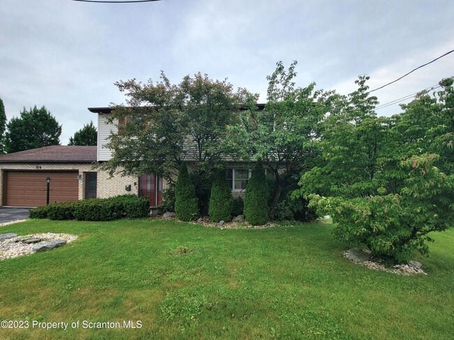 Building Photo - 319 Carnation Dr