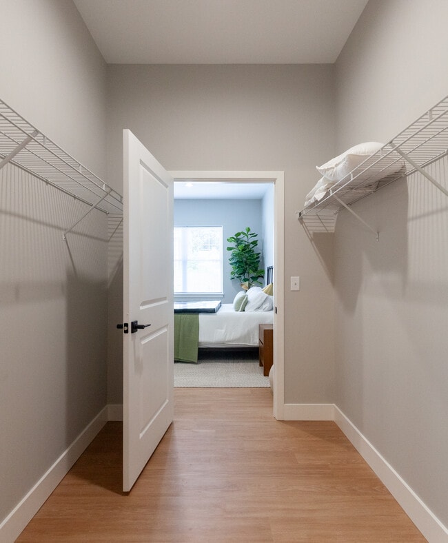 Walk through closet into Bedroom - Founders Square