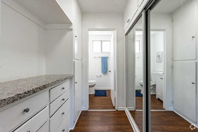 Studio - 605SF - Closet - Palm Gate Apartments