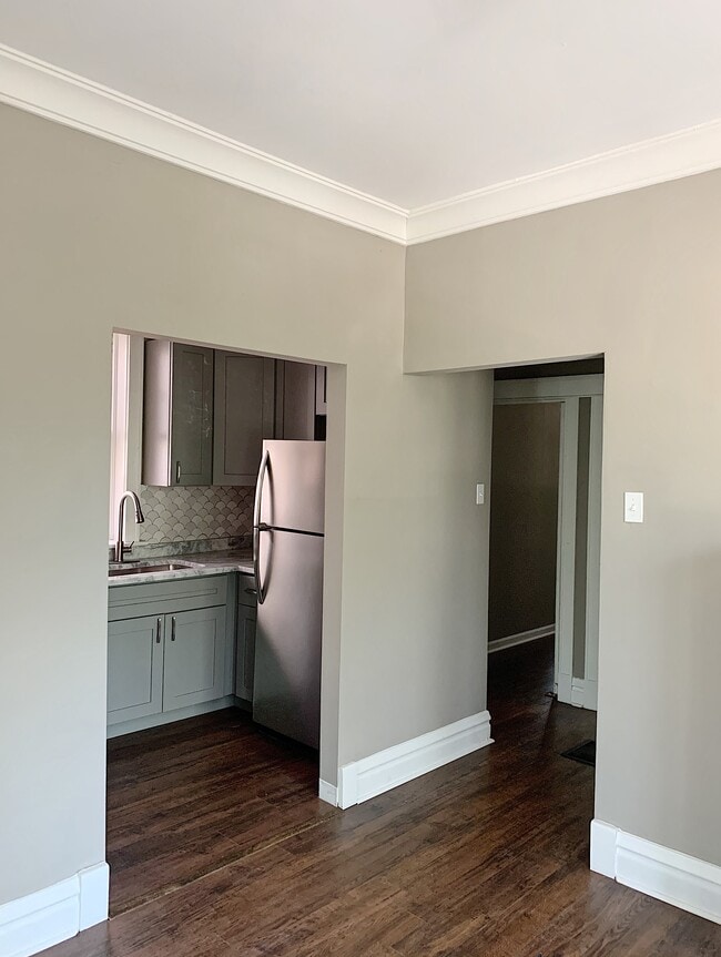 Dining room looking into kitchen - 5201 Murdoch Ave