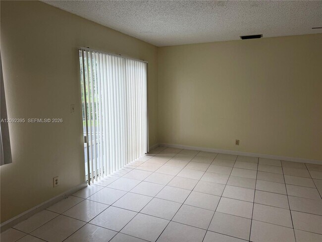 Building Photo - 7800 NW 44th Ct