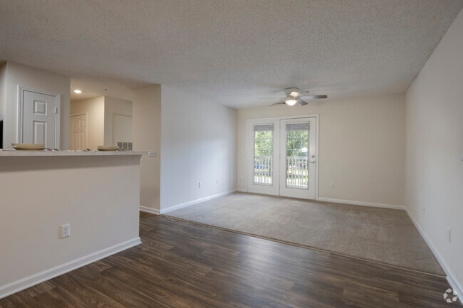3BR, 2BA - 1,053SF - Dining Area / Living Room - Preserve at Laurens Creek