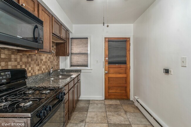 Foto del edificio - 8910 Grand Ave