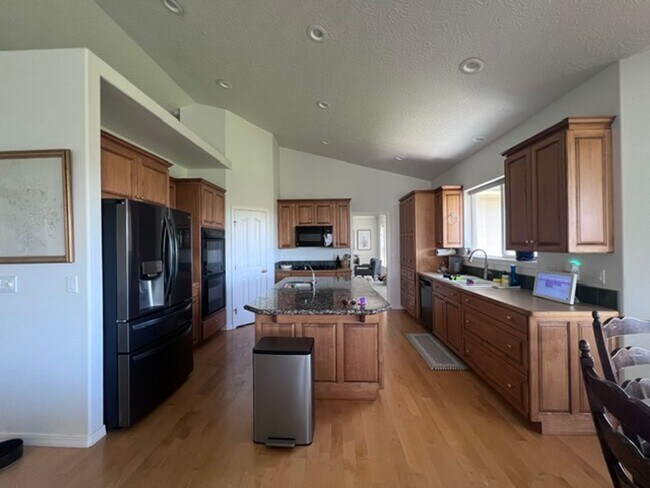 Building Photo - Custom Home in a Serene Setting - Large Lo...