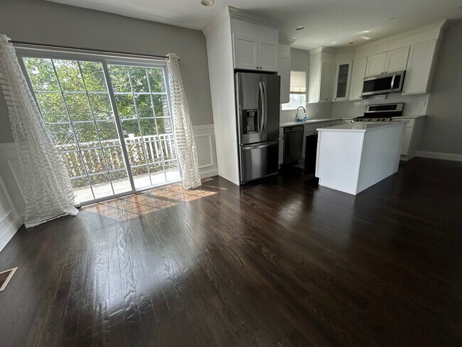 1st floor Kitchen and sliding door to balcony - 324 Cross St