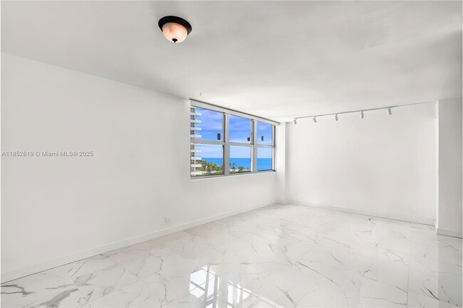 Building Photo - 5055 Collins Ave