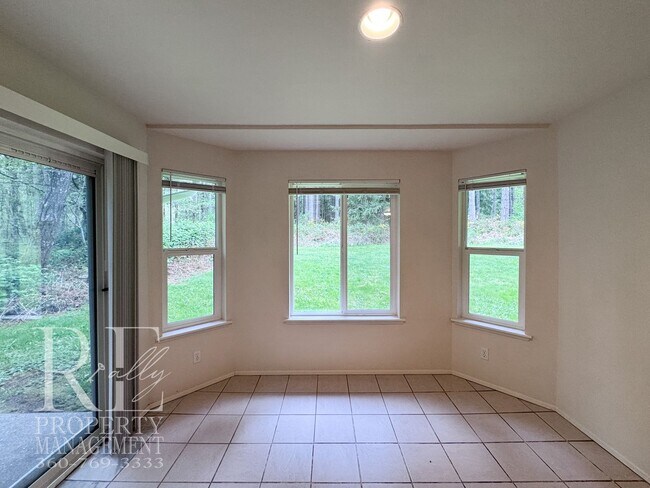 Building Photo - Bright Single-Story Duplex with Spacious Yard & Covered Porch