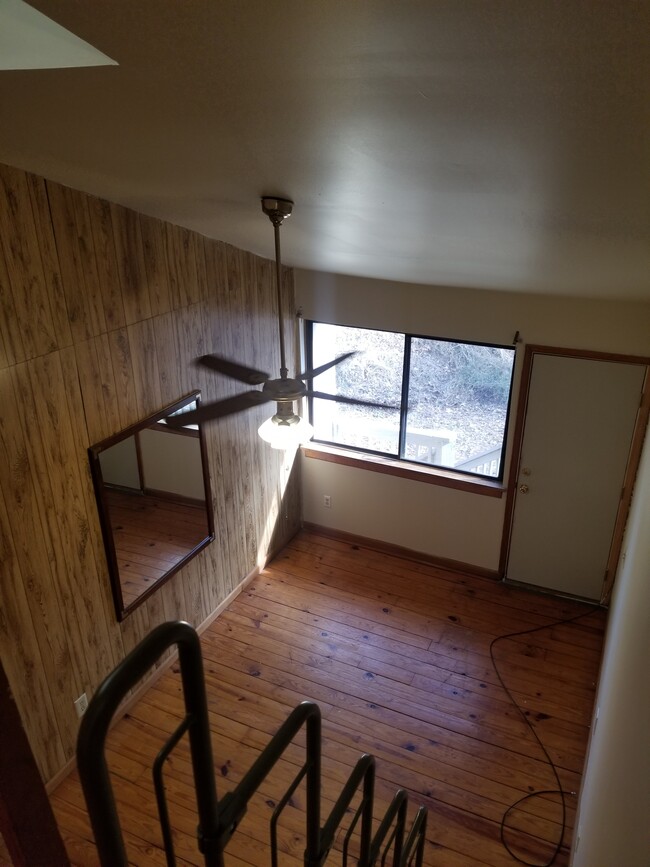 loft view down into bedroom - 222 Stribling Ave