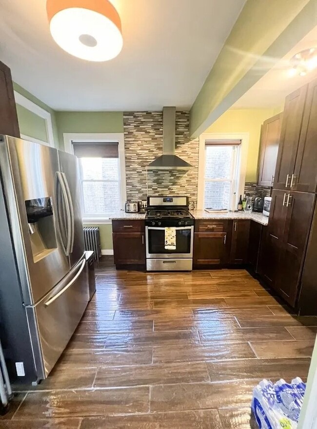 Building Photo - 6830 S Paxton Ave