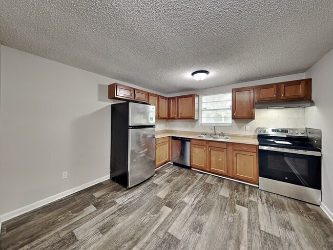 Building Photo - 7627 Mc Cowan Dr