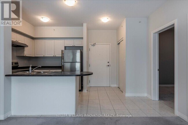 Photo du bâtiment - 299 Cundles Rd E