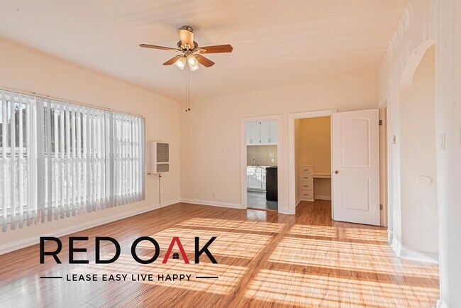 Building Photo - Airy, Spacious Studio with Lovely Hardwood...