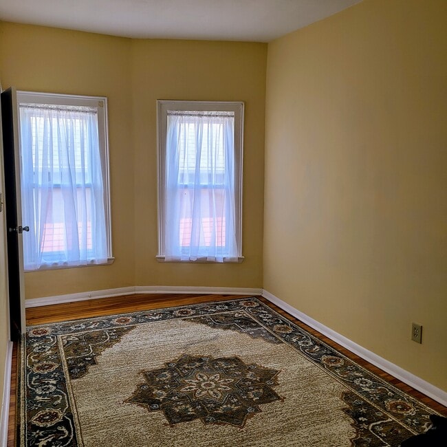 2nd Bedroom, carpet, curtains, large closet - 715 N McBride St