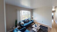 Located at 522 West K Street in Benicia, California, this single-floor residence offers a well-organized layout designed for comfortable everyday living. The kitchen is efficiently arranged with ample white cabinetry, wood-look flooring, stainless steel appliances including a gas range and refrigerator, and a double-basin sink — providing generous storage and workspace. Adjacent to the kitchen, the dining area features the same warm wood-look flooring, a ceiling fan, and convenient built-in shelving and closet storage nearby. The living room is bright and welcoming, with large sliding glass doors and windows that invite natural light and provide outdoor views, complemented by wood-look flooring and a textured ceiling. The unit includes multiple bedrooms, each finished with plush carpet, ceiling fans, and windows that bring in natural light. One bedroom offers extra flexibility with ample floor space, suitable for use as a home office or guest room. The bathroom is clean and practical, featuring a tub-shower combination with sliding frosted glass doors. Throughout the unit, neutral tones and consistent finishes create a cohesive and functional living environment.