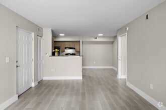 1BR, 1BA - 751SF - Living Room/ Dining Room/ Kitchen - Vista Verde at Coconut Creek