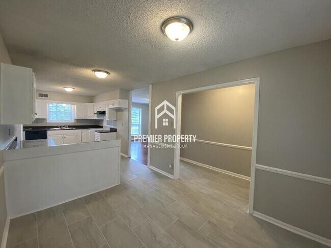 Building Photo - Adorable 4 bedroom 2 bath brick home.