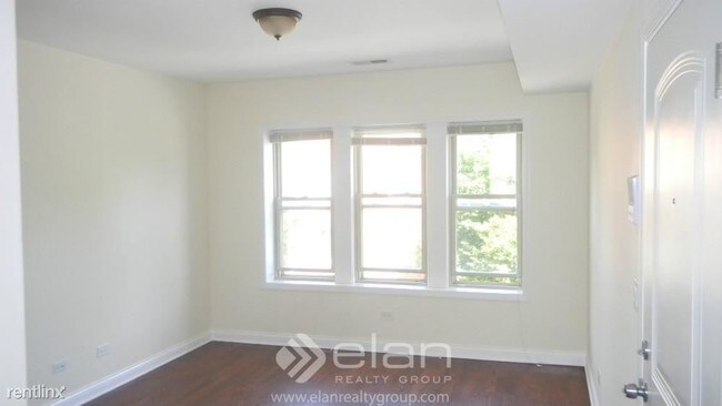 Building Photo - 4715 W Cornelia Ave