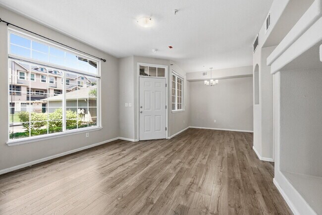 Building Photo - $1,745.95 - Ground-Level 1 Bed + Flex Room | 1.5 Bath Condo with Community Pool