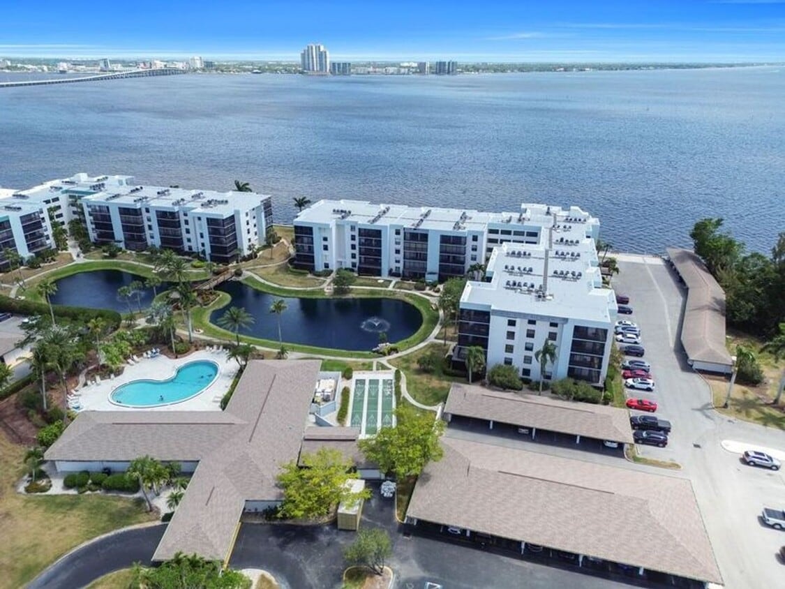 Primary Photo - Riverfront Condo Location 1,100+ square fe...