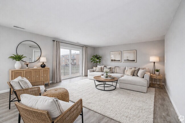 Sala de estar - Lansing Grove Apartments