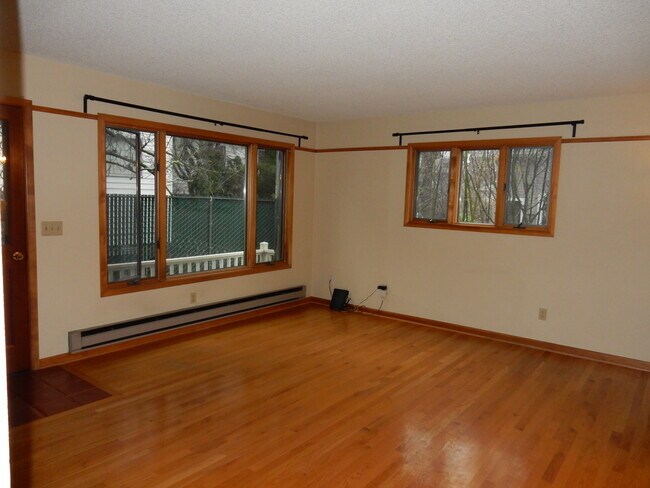 Living room with large windows and lots of natural light. - 2169 NE Multnomah St