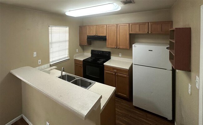 Foto del edificio - 8510 Woodstone Dr
