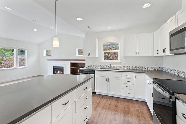 Great storage! Island kitchens with quartz countertops. - Cottages on the Ridge - 55+