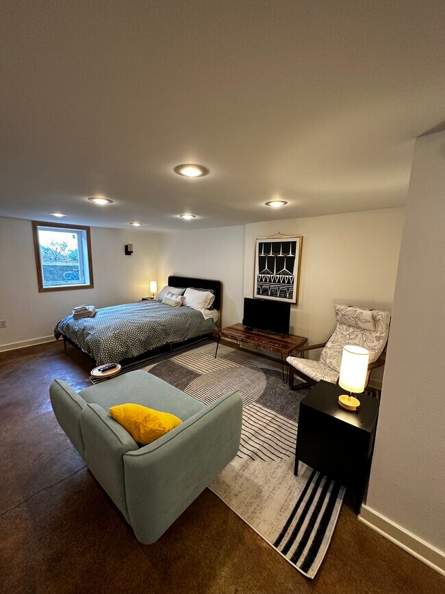 Bed and sitting room with firestick TV - 6434 N Kerby Ave