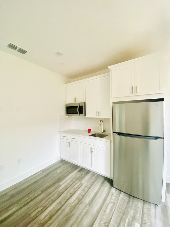 Kitchenette Includes Refrigerator, Microwave, and a Sink - 4065 Happy Camper Way