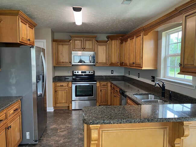 Building Photo - Spacious Home Centrally Located
