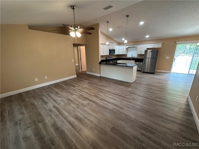 Building Photo - 7779 N Triana Dr