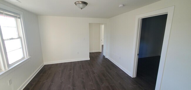 Living Room leads to 3 bedrooms - 1084 S Hanover St