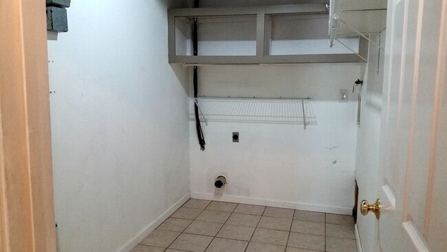 Laundry Room with Electric Dryer Hookup and Shelving - 529 Strawberry Hill Rd