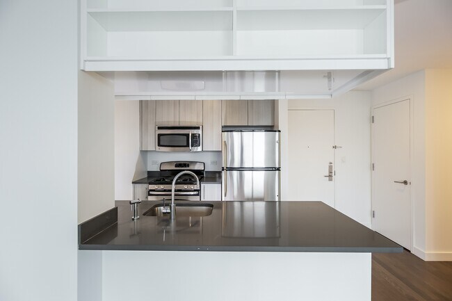 Building Photo - Bright corner one bed with W/D in unit