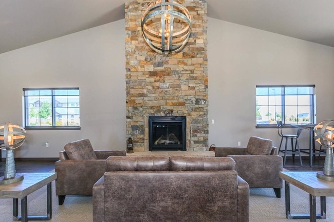 Community Lounge with a Cozy Fireplace - Inter Urban