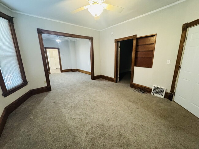 Building Photo - Charming 1-Bedroom + Den Retreat on Colfax Ave – Your Cozy Minneapolis Haven Awaits!