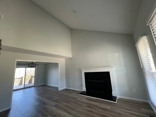 Living room/vaulted ceilings - 14106 W 87th Terrace