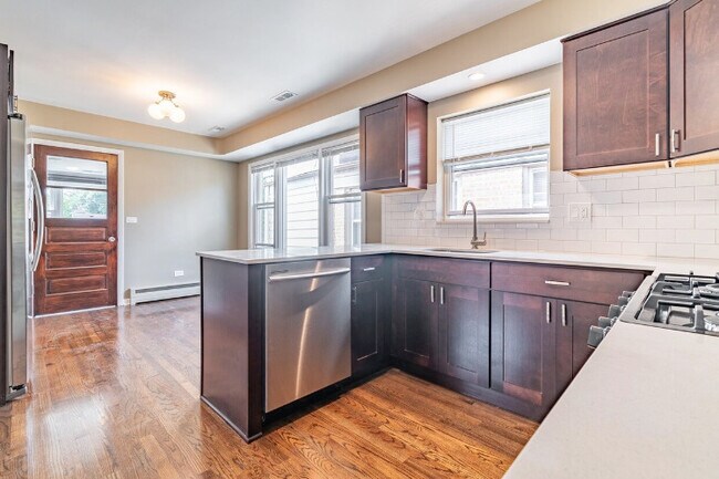 Building Photo - 5724 N Miltimore Ave