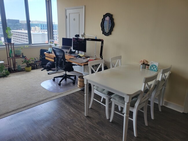 Living room + dining room - 555 Massachusetts Ave NW