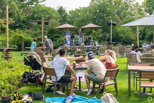 Summer brings family and friends out to see live music at Wheaton's Cantigny Beer Garden.
