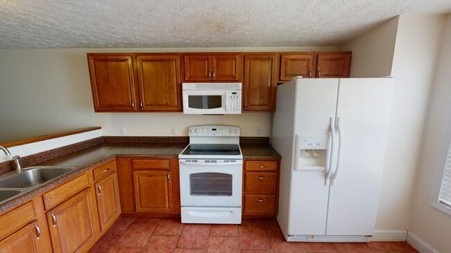 Foto del edificio - 7112 Country Club Dr