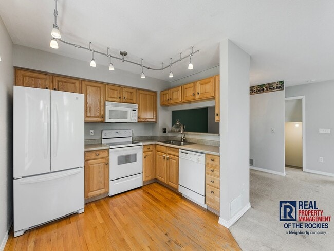 Building Photo - Fort Collins Townhouse with Vaulted Ceilin...