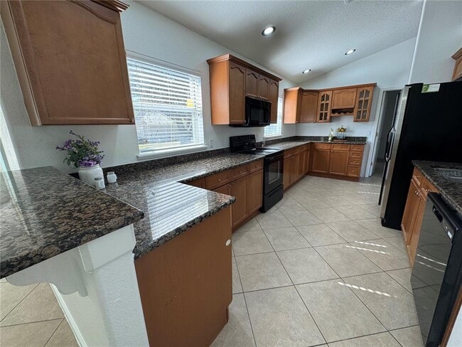 Foto del edificio - 14940 Day Lily Ct