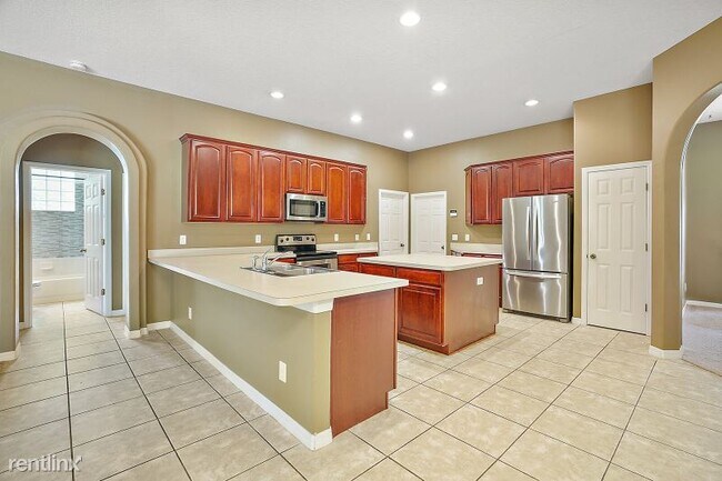 Building Photo - 4 br, 3 bath House - 24728 Calusa Blvd.