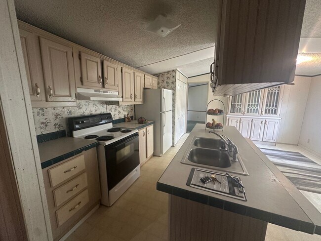 Foto del edificio - 3-bedroom, 2-bathroom Mobile Home Now Avai...