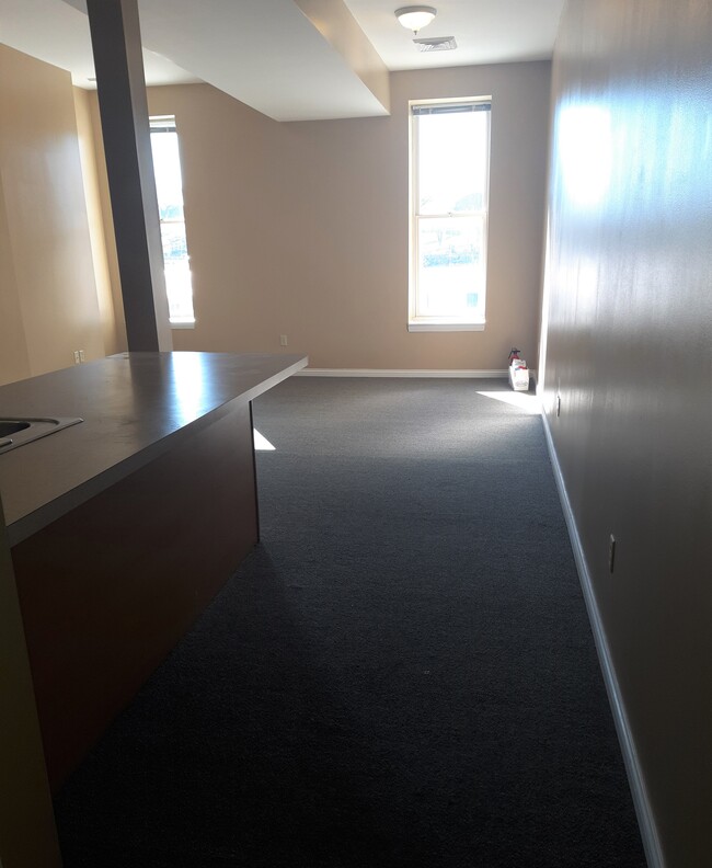 Unit 2B: Living Room - 112 E Main St